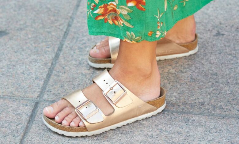 Woman Wearing Birkenstock Sandals Stock Photo