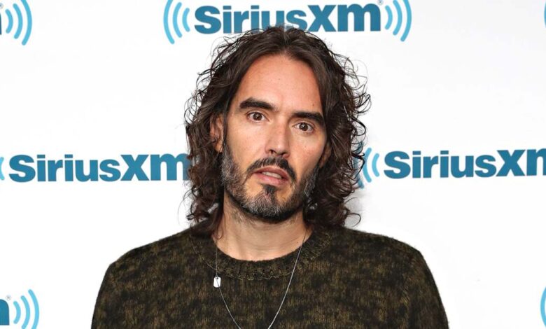 feature russell brand charged with rape and sexual assault in the uk after previously denying allega